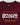 Close-up of puff print "Gracie Barra" logo in white with yellow "Brazilian Jiu-Jitsu" text on maroon fabric.