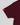 Close-up of maroon youth t-shirt sleeve with red Gracie Barra Legacy G tag.