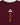 Close-up of back neck detail showing white Legacy G logo above yellow "ESTD 1986" text on maroon fabric.