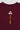 Close-up of back neck detail showing white Legacy G logo above yellow "ESTD 1986" text on maroon fabric.